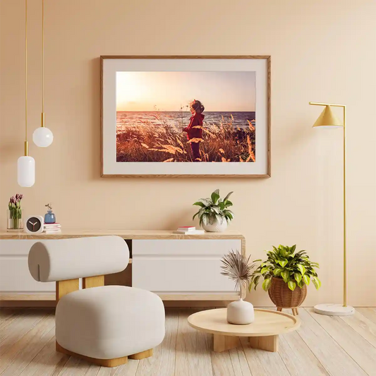 Girl Overlooking at Sunset by the Bay with Grass Field