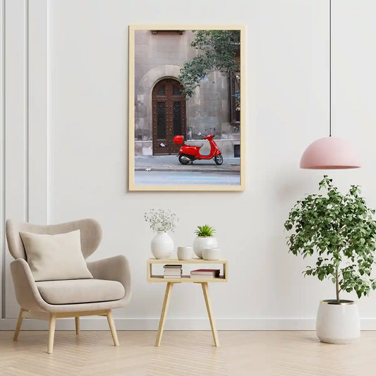 Red Vespa Scooter Parked in a Side Street of a Heritage Building in Europe