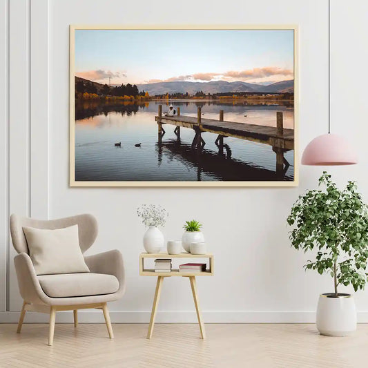 Lake Pier with Ducks and Woman Sitting with Guitar in Cromwell New Zealand