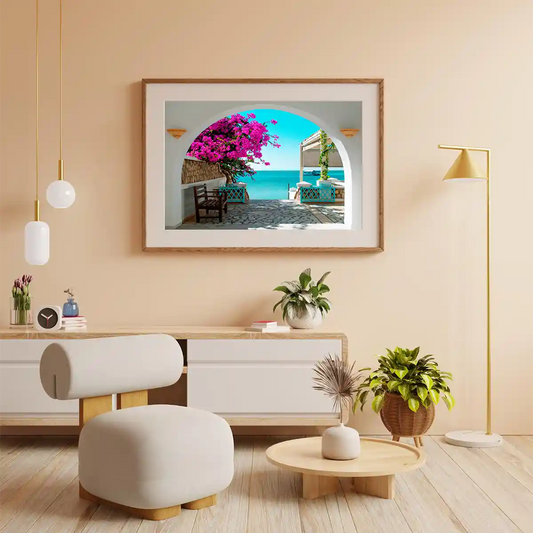 Tunisian Sea Overlooking on White Archway of a Porch with Blooming Red Flowers