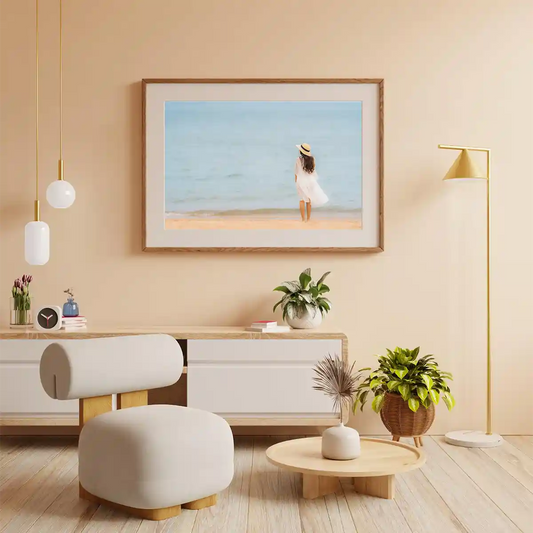 Woman in Summer Dress Looking at the Ocean