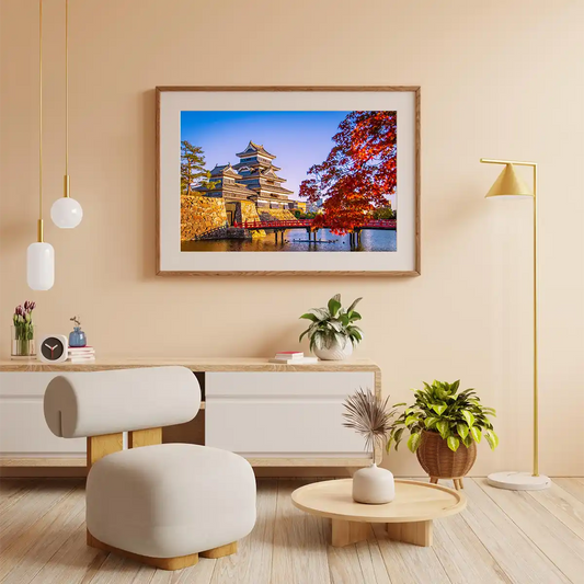 Matsumoto Castle with Maple Leaves at Autumn in Nagano Japan