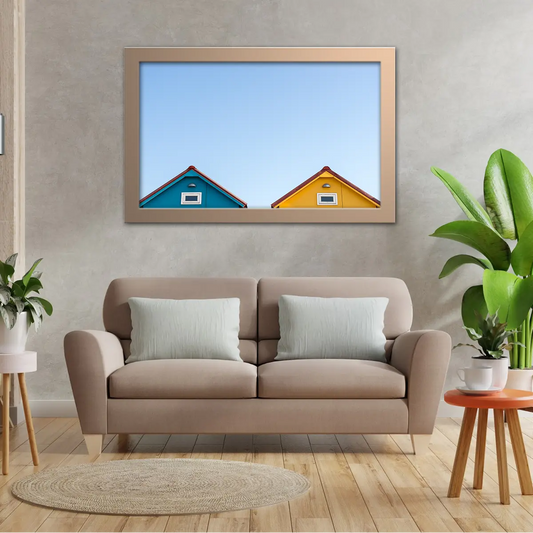 Peeping Beach House Rooftops Over Clear Blue Skies