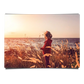 Girl Overlooking at Sunset by the Bay with Grass Field