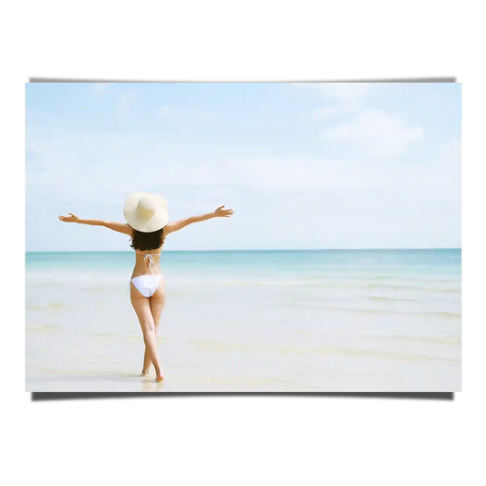 Woman Enjoying The Beach View With Wide Arms Open