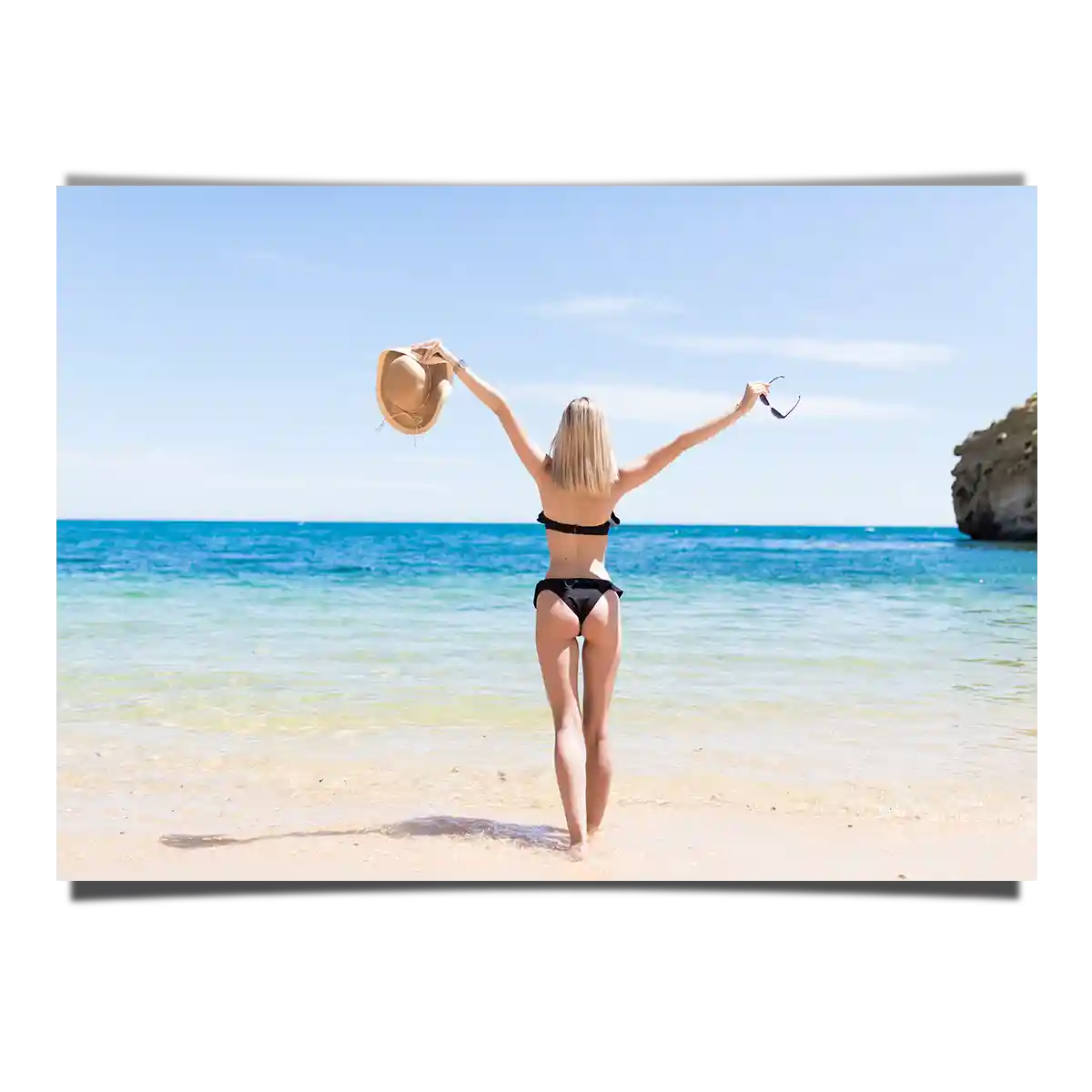 White Sand Beach View with a Woman Open Arms Standing Under the Sun