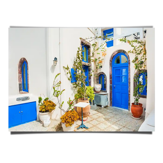 Traditional Greek White Architecture with Blue Doors and Windows in Santorini Island Greece