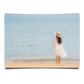 Woman in Summer Dress Looking at the Ocean