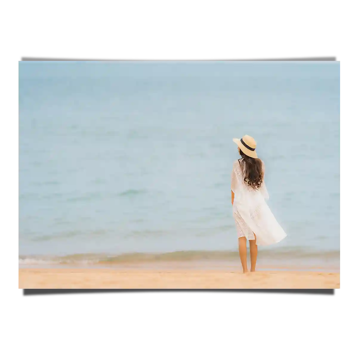 Woman in Summer Dress Looking at the Ocean