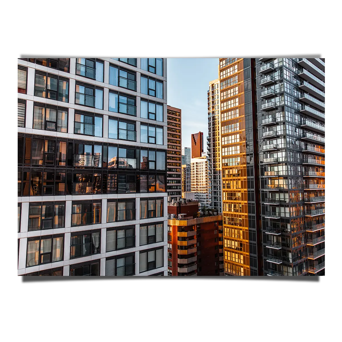 Glass Panels on City Downtown Reflecting The Sunset