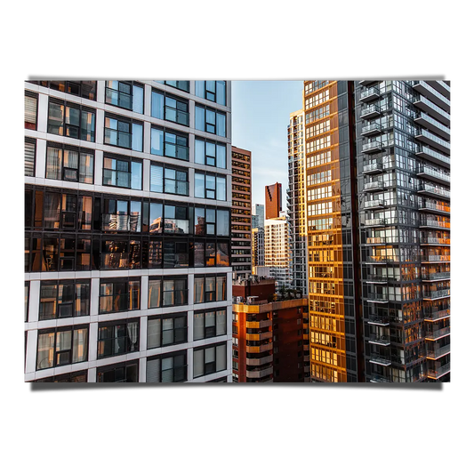 Glass Panels on City Downtown Reflecting The Sunset