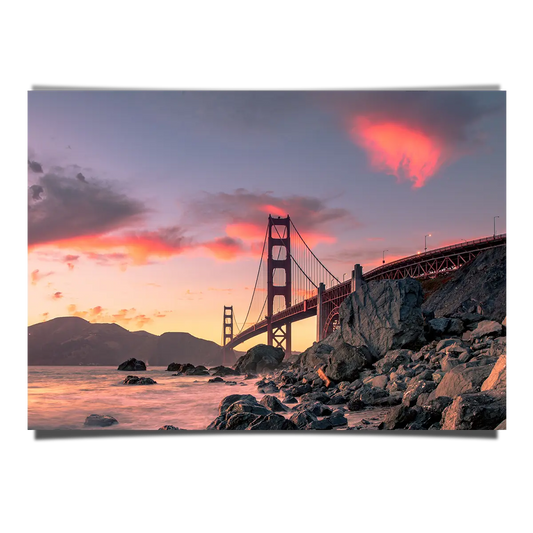 The Golden Gate Bridge Over Rock Formation on Sunset in San Francisco California