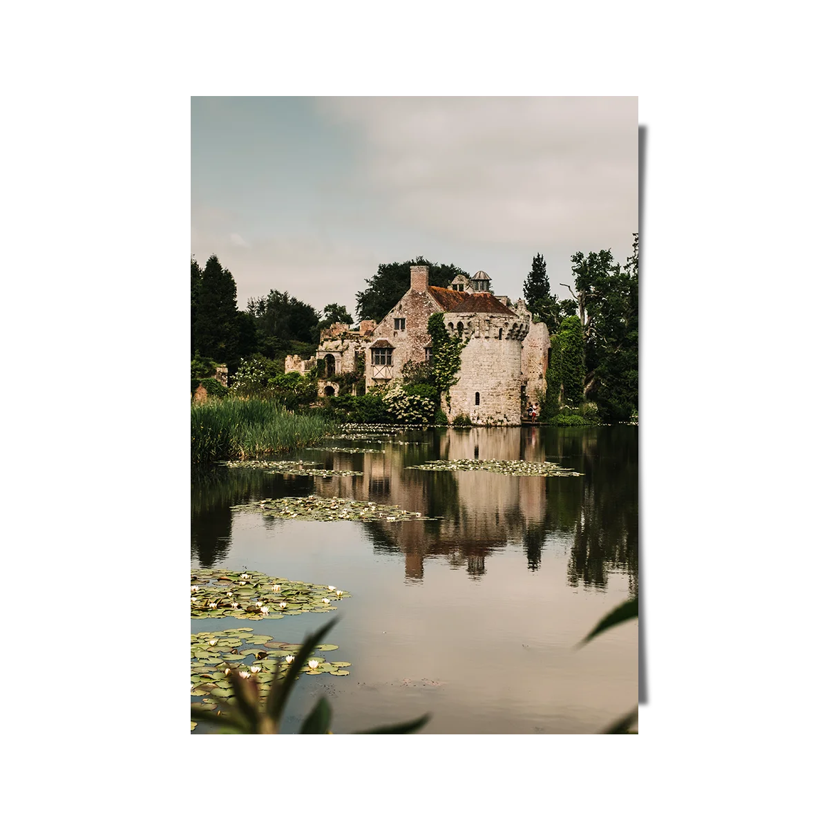 Old Castle Surrounded By Pond