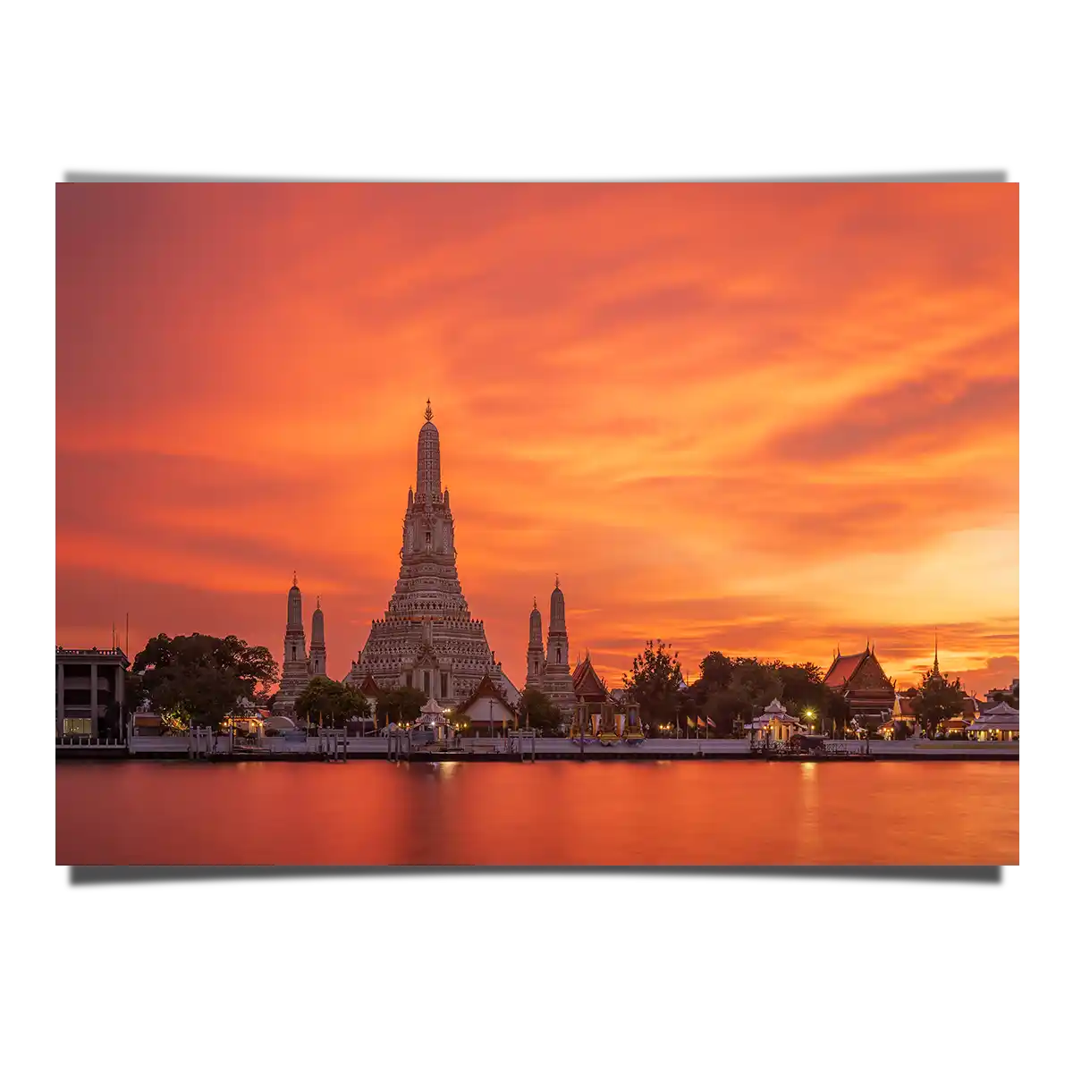 Wat Arun Temple Under the Red Sunset Skies in Bangkok Thailand